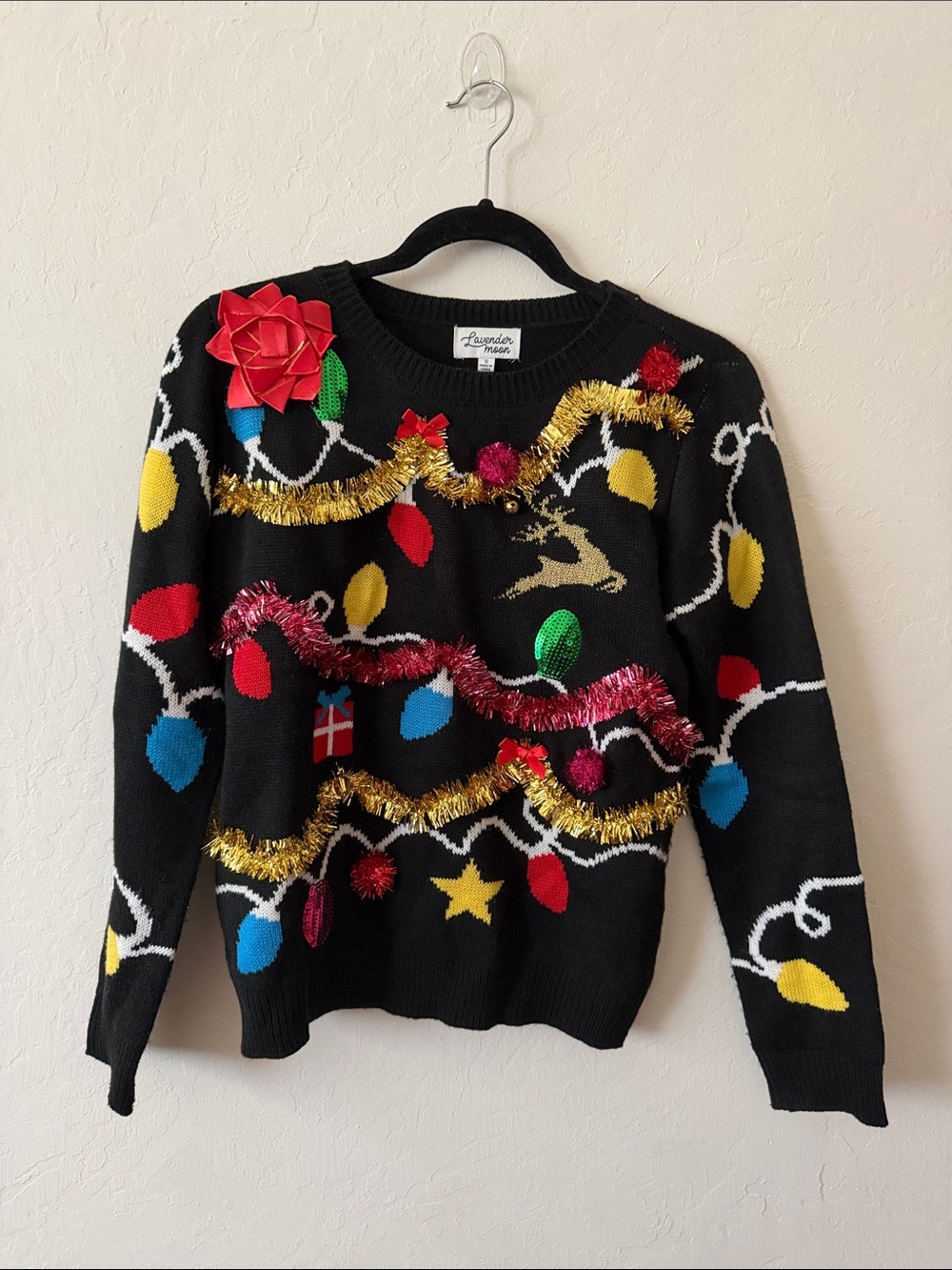 Lavender Moon Black Holiday Ugly Sweater with Colorful Lights and Tinsel